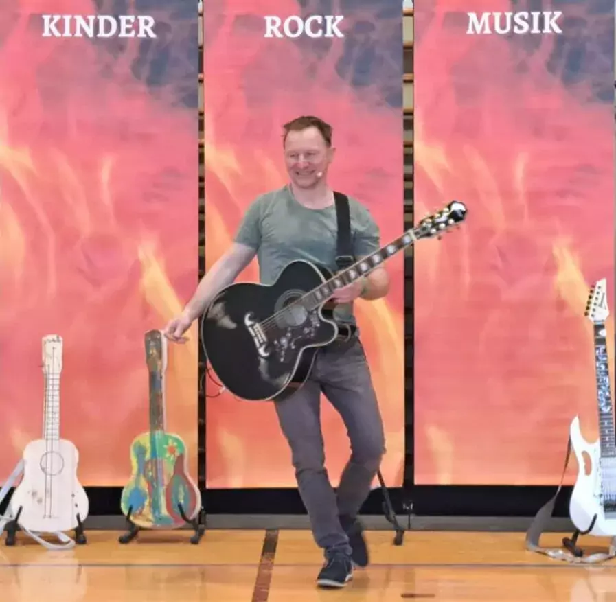 DerAndre_Kindermusik_Kinderlieder_Rockige_Mitmachkonzerte für Kinder_Logo